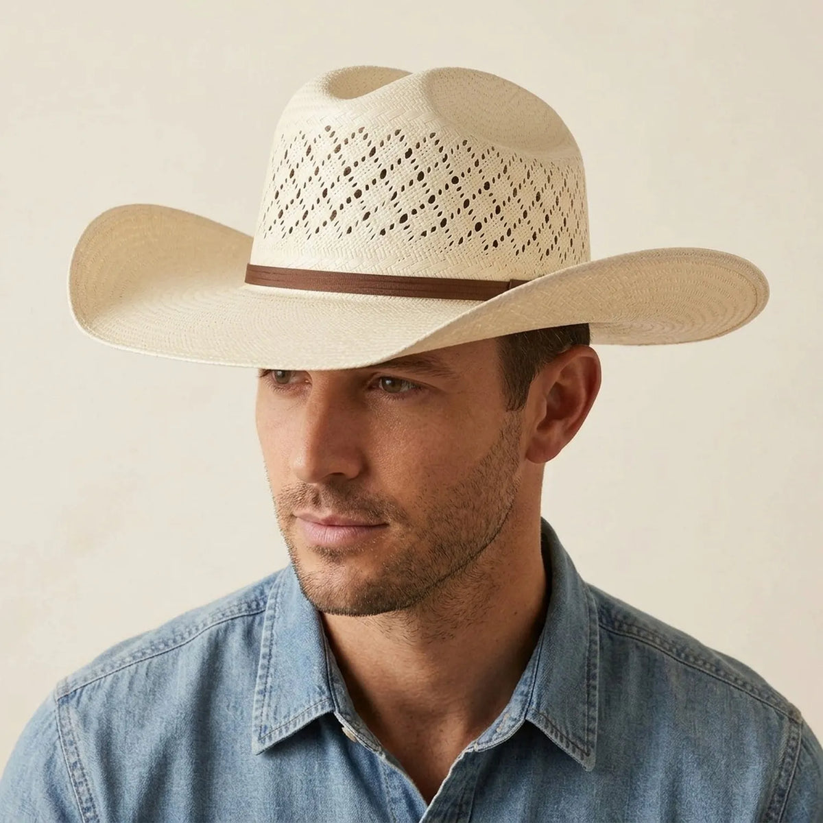 Cream Vented Straw Cowboy Hat with Brown Leather Buckle Band