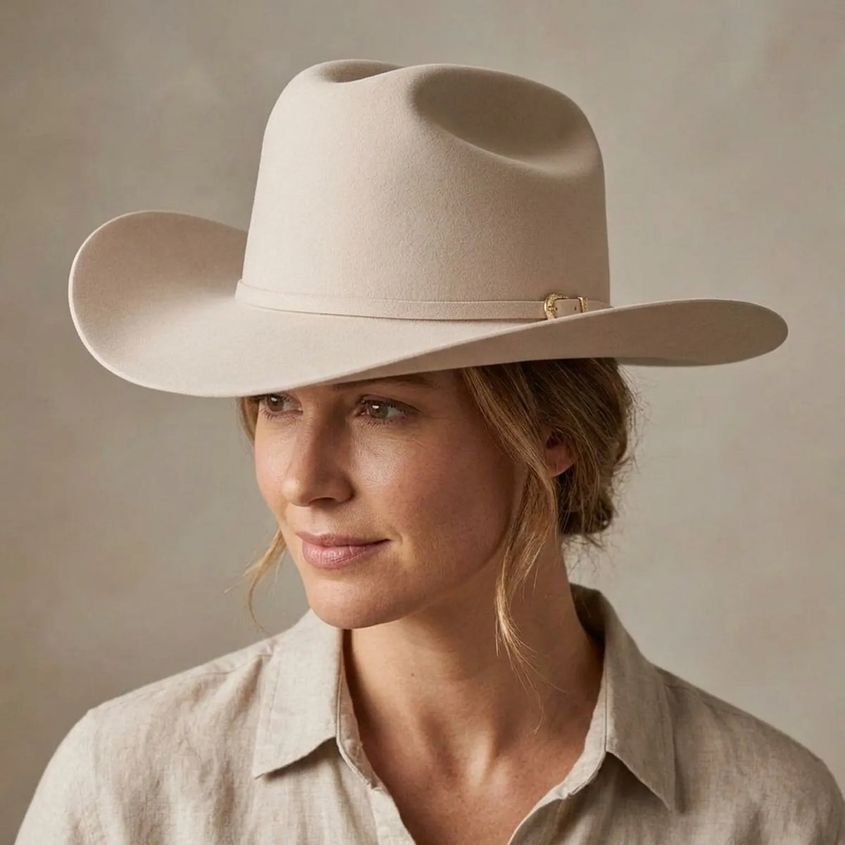 Cream Felt Cowboy Hat with Pinched Crown and Curved Brim