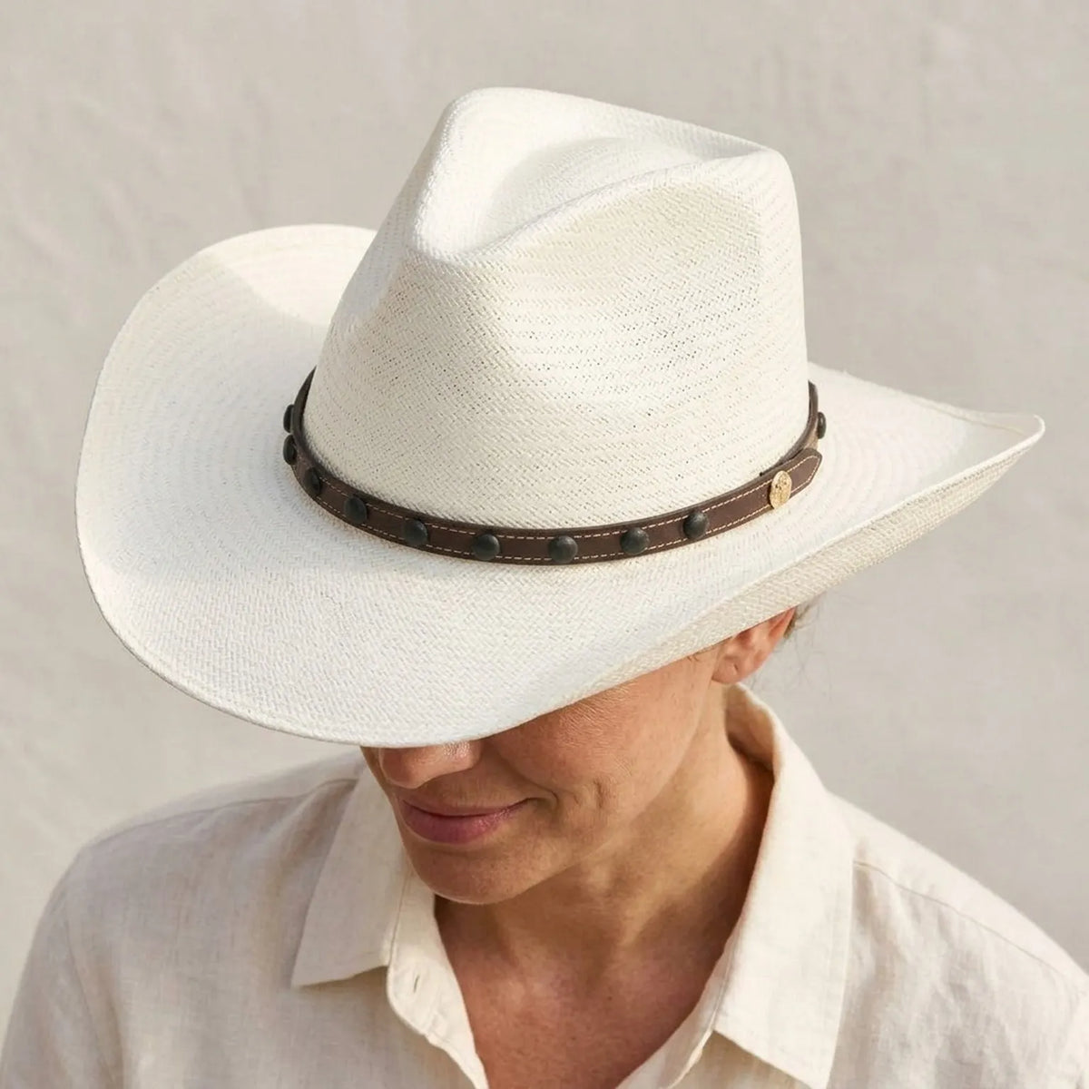 Unisex White Straw Cowboy Hat with Studded Leather Band Detail