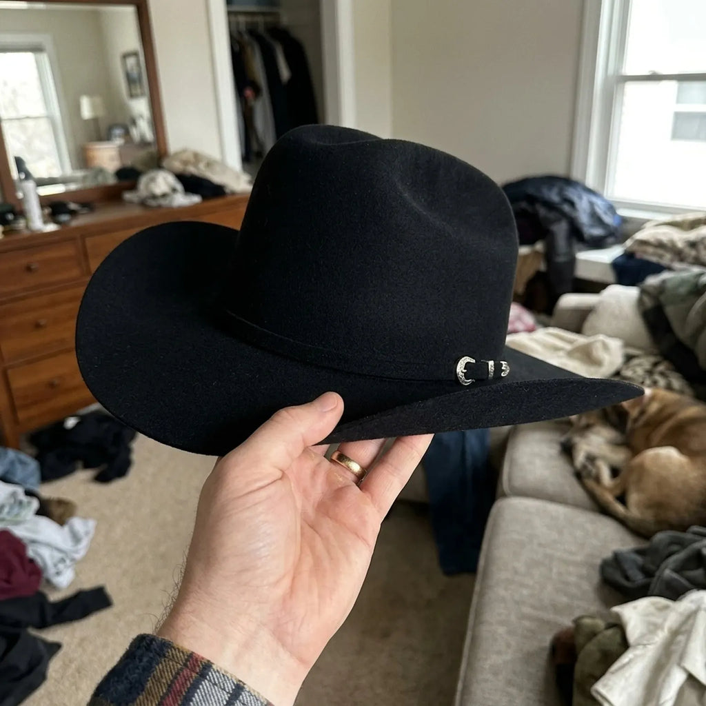 Black Felt Cowboy Hat with Pinched Crown and Wide Curved Brim