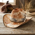 Speckled Tan Cowboy Hat with Paisley Bandana and Silver Concho