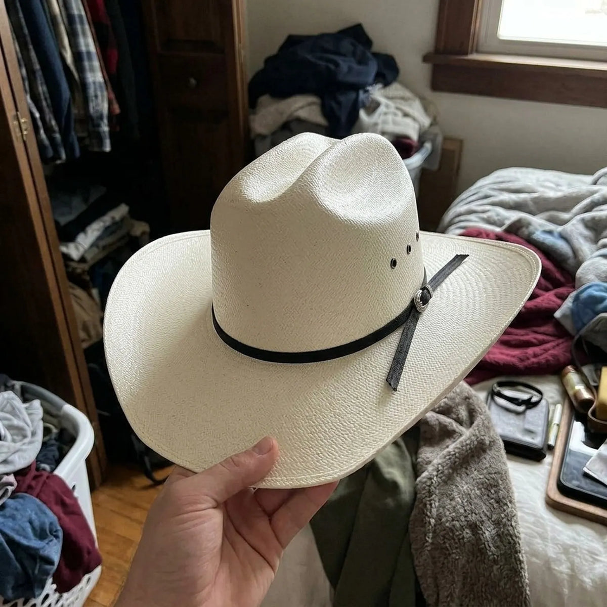 White Straw Cowboy Hat with Pinched Crown and Black Tie Band