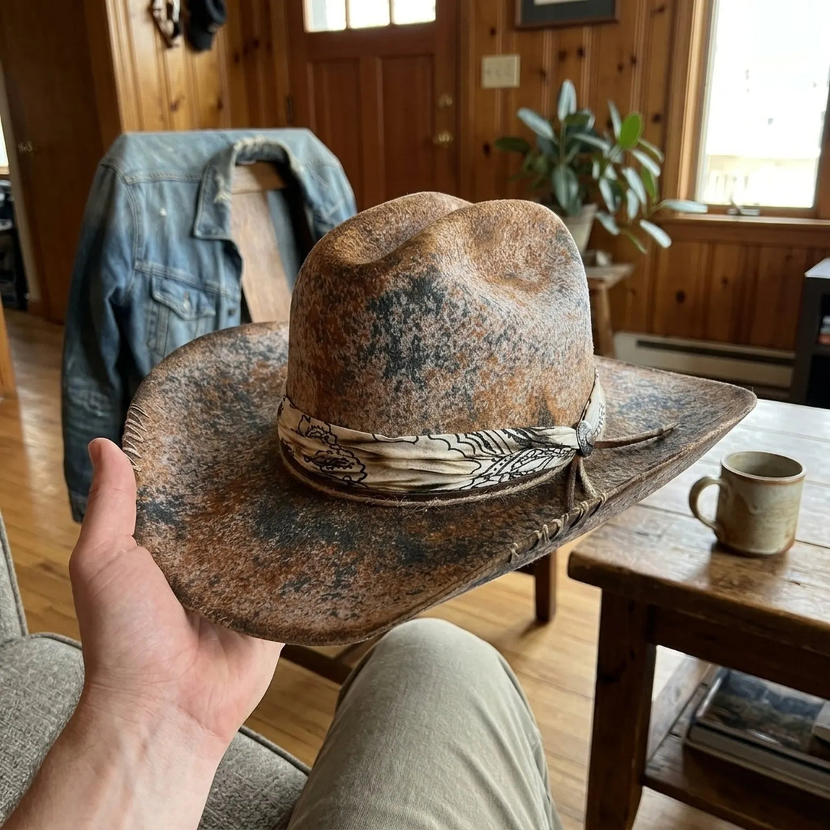 Weathered Brown Cowboy Hat with Paisley Bandana and Stitching