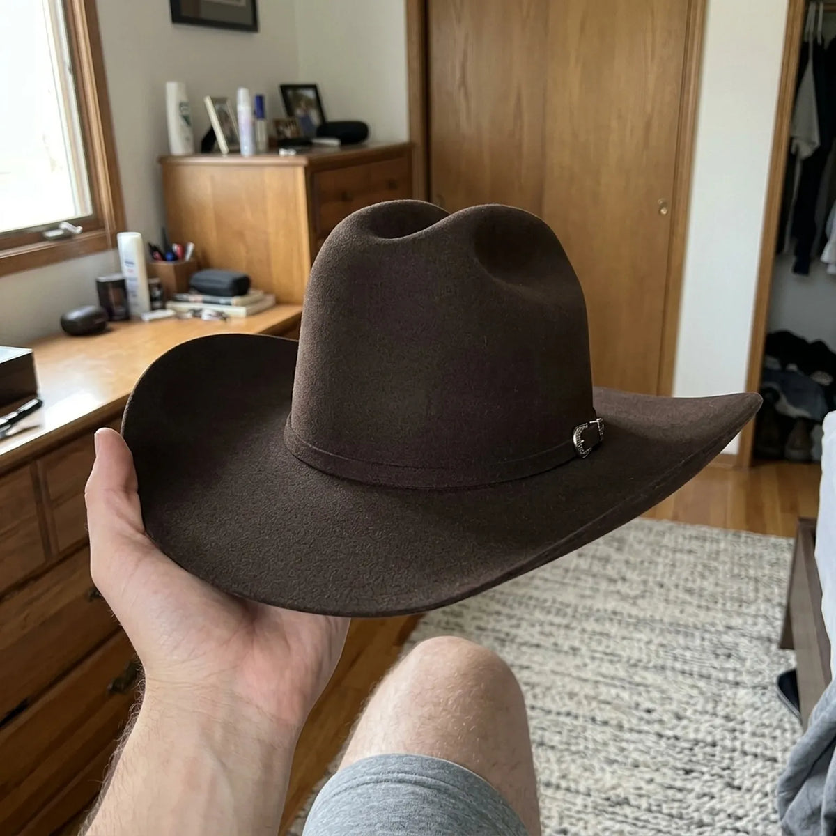 Dark Brown Felt Cowboy Hat with Pinched Crown and Curled Brim