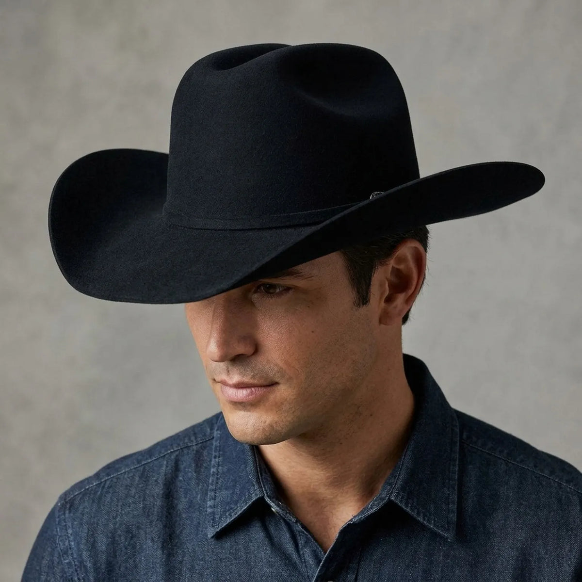 Black Felt Cowboy Hat with Deep Pinched Crease and Upturned Brim