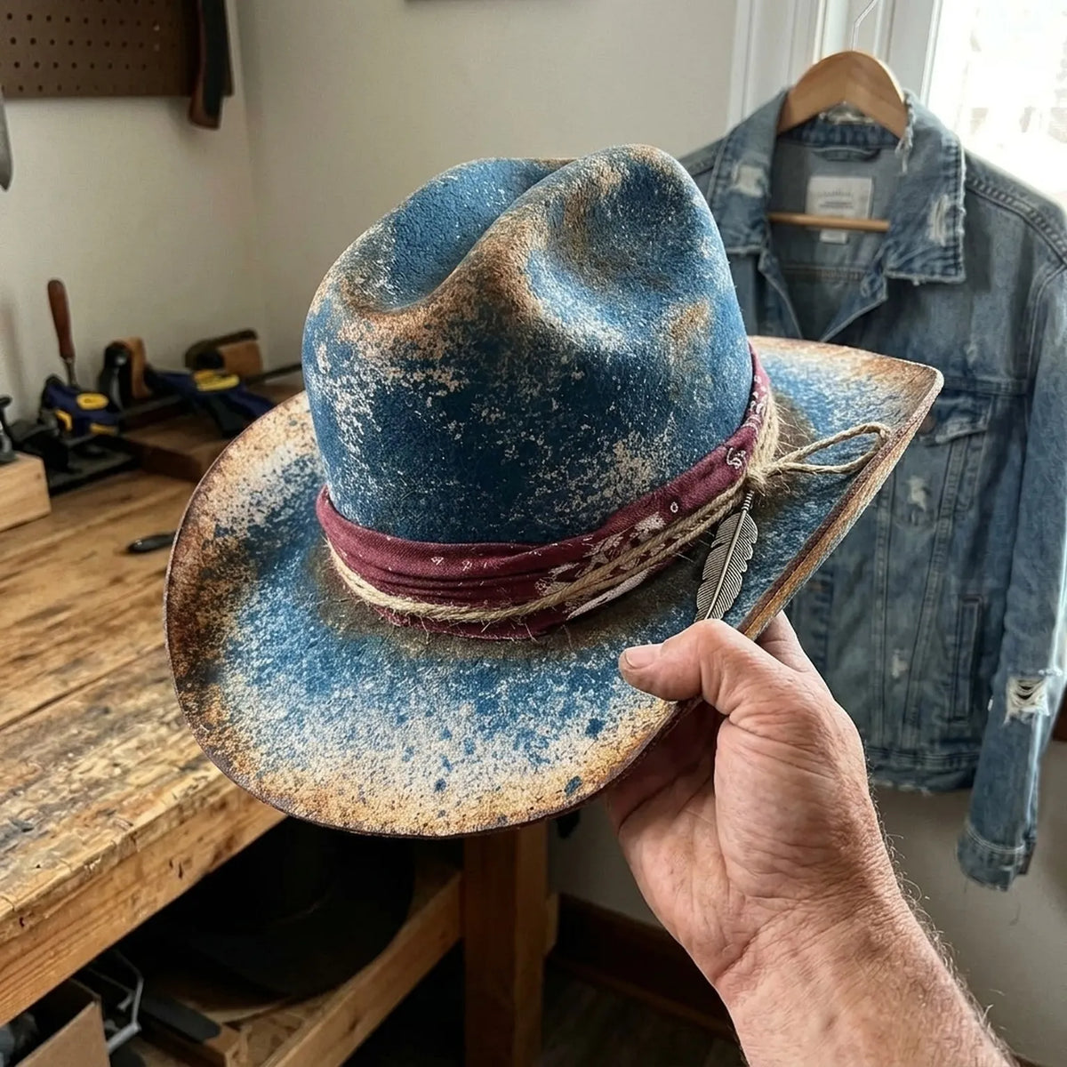 Distressed Blue Cowboy Hat with Feather Charm and Bandana Band