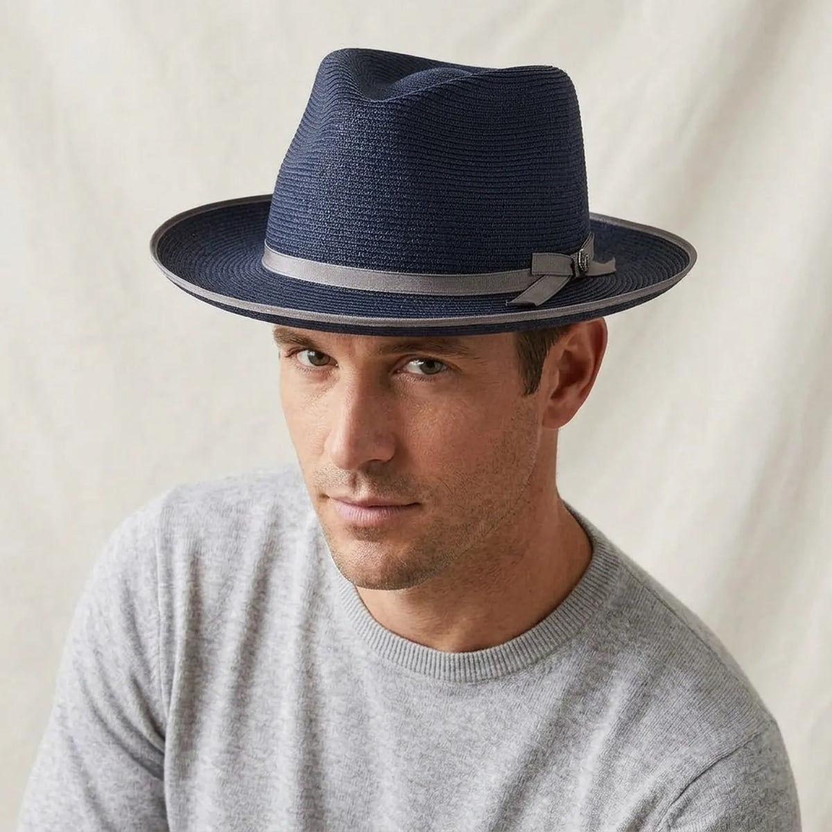 Navy Blue Straw Fedora with Gray Ribbon and Bow Accent