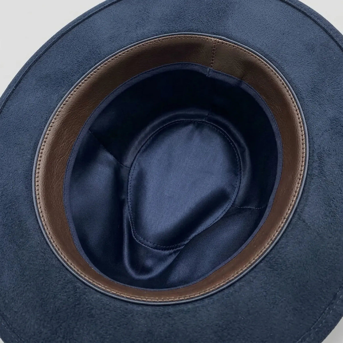Navy Felt Western Hat with Leopard Brim and Feather Brooch