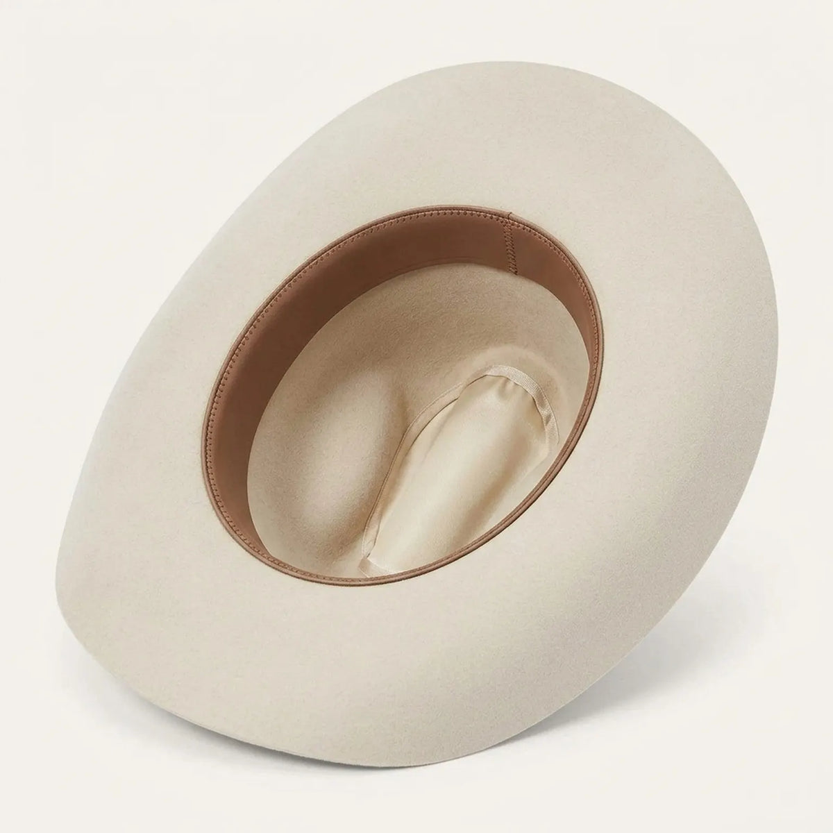Cream Wool Felt Cowboy Hat with Feather Accent and Upturned Brim