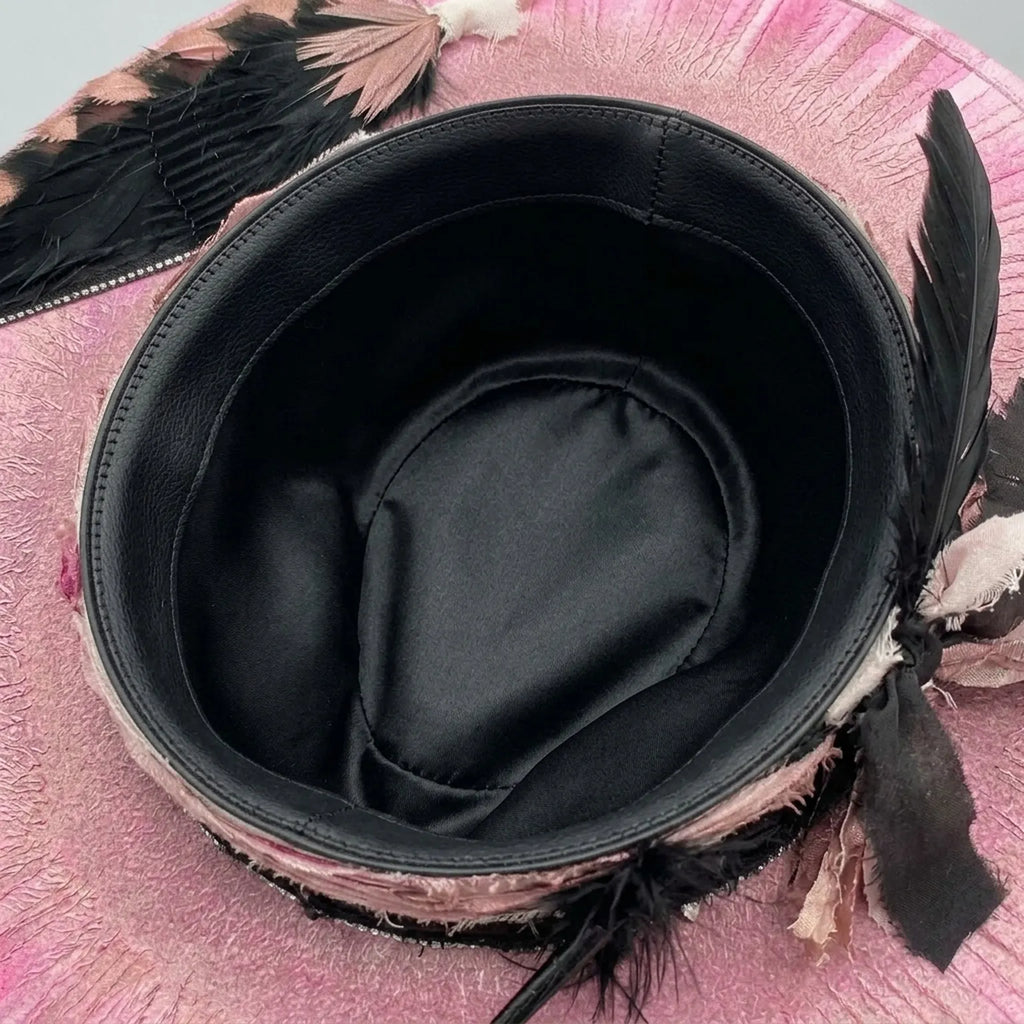 Pink Wide-Brim Floppy Hat with Black Feather and Ruffled Band