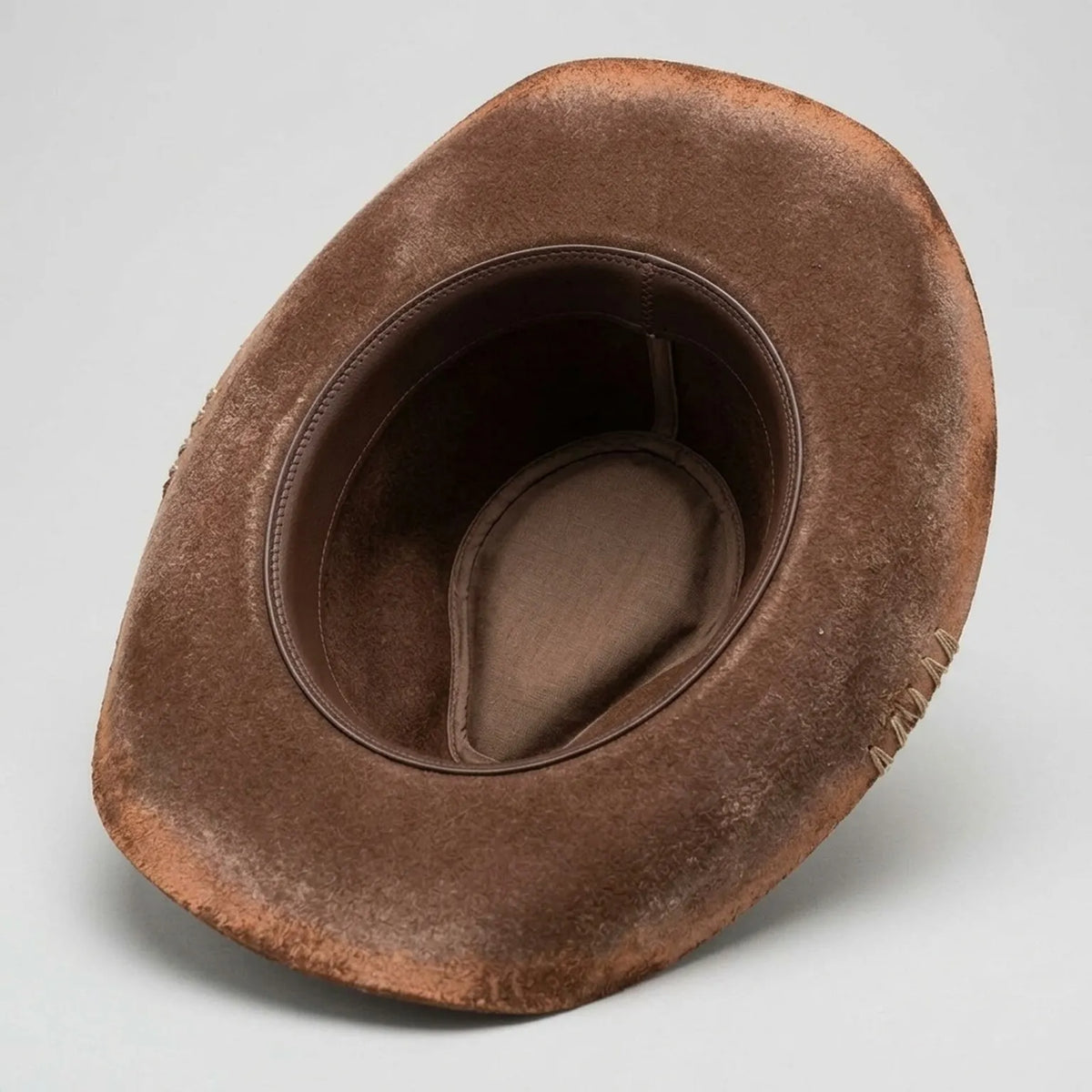 Distressed Brown Cowboy Hat with Paisley Bandana and Jute Rope