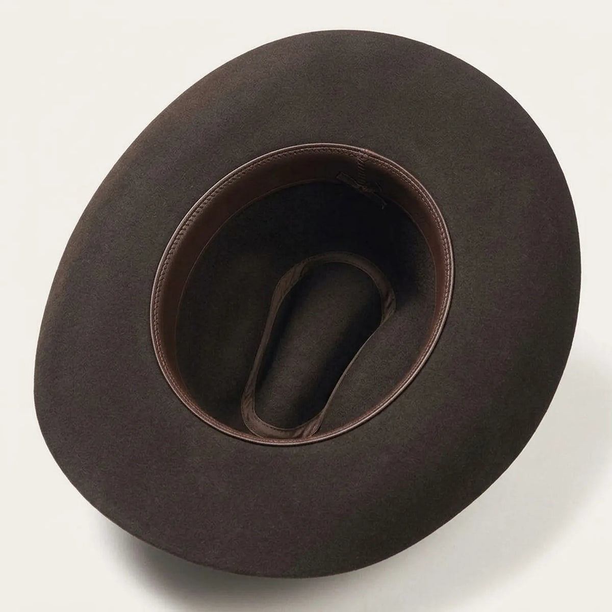 Dark Brown Felt Cowboy Hat with Pinched Crown and Curved Brim