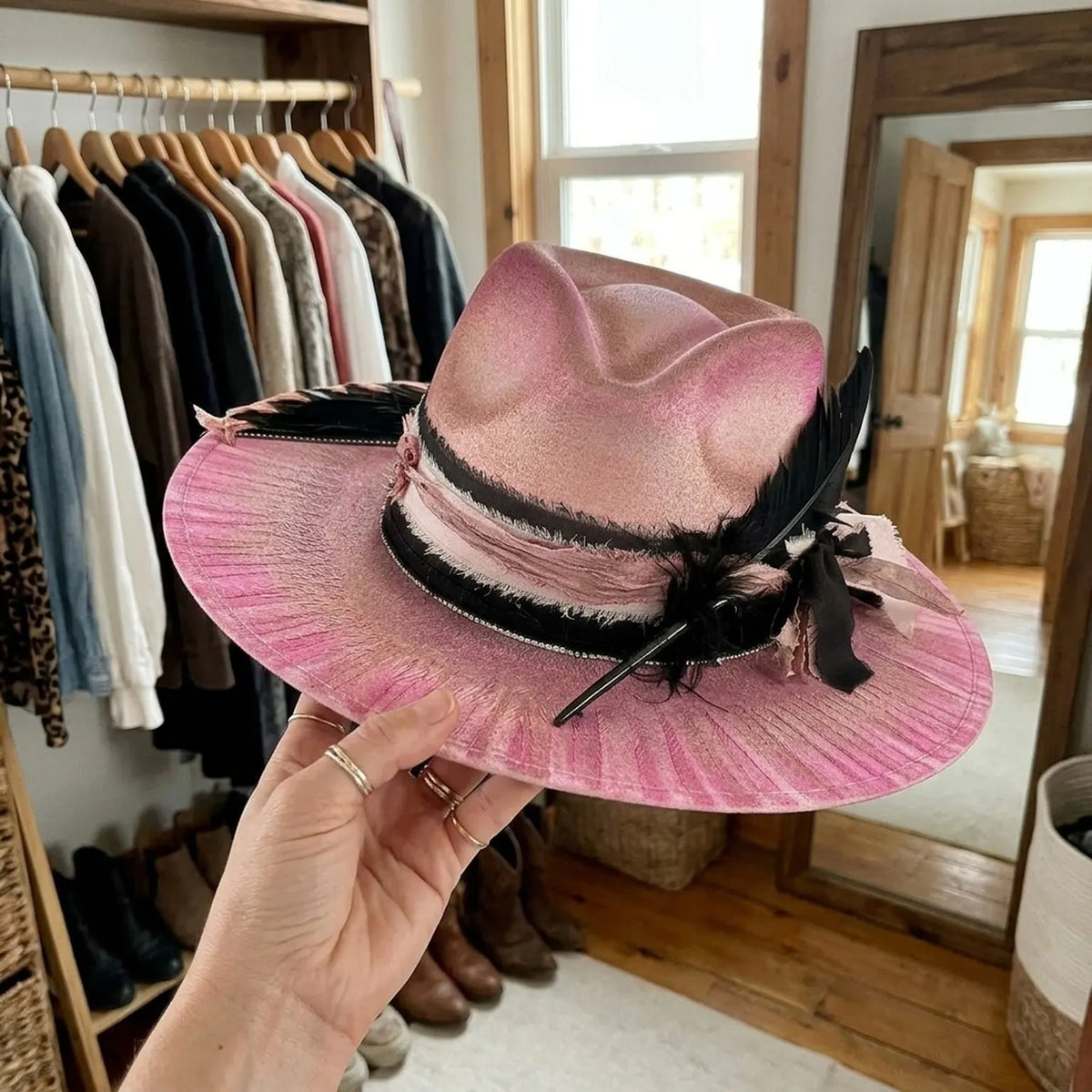 Pink Wide-Brim Floppy Hat with Black Feather and Ruffled Band