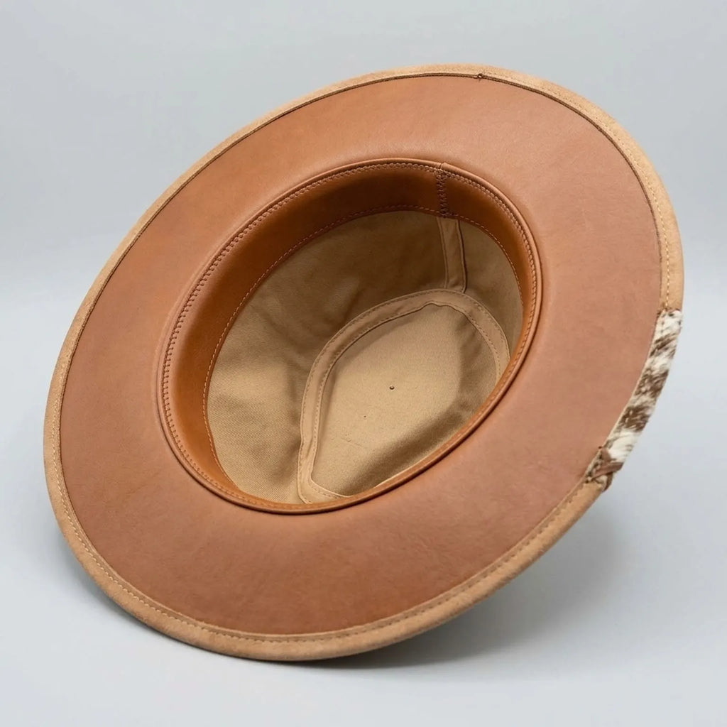 Tan Felt Cowboy Hat with Cow Print Brim and Feather Trim