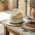White Perforated Straw Fedora with Black Band and Bow Detail