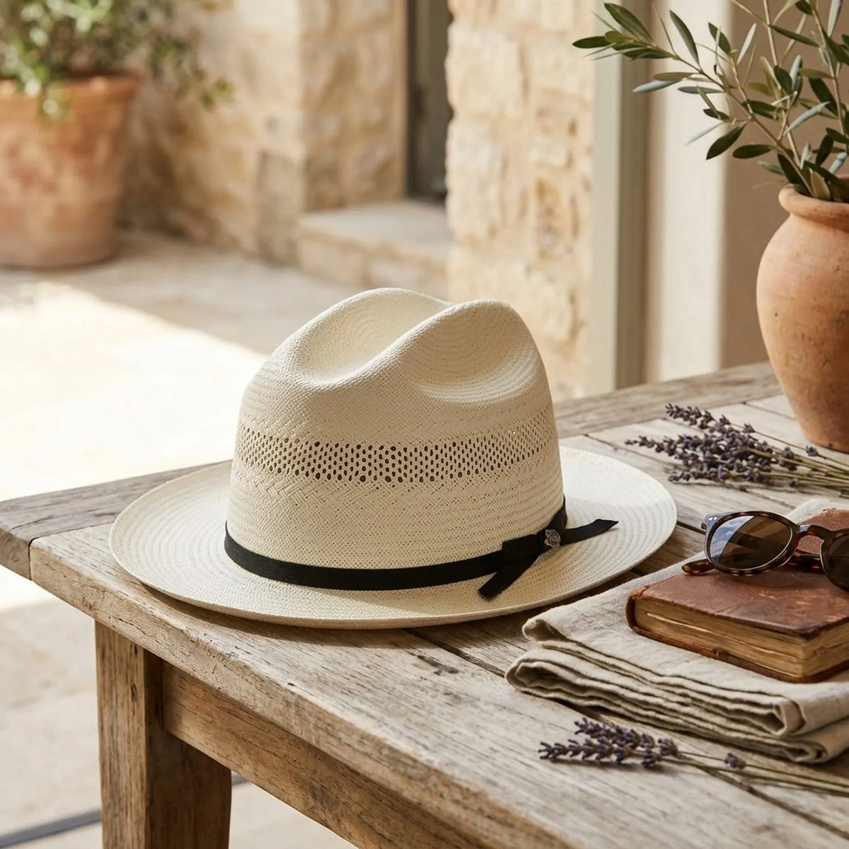 White Perforated Straw Fedora with Black Band and Bow Detail
