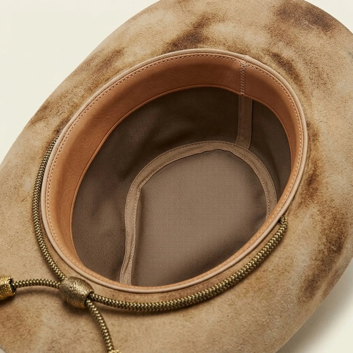 Distressed Tan Cowboy Hat with Braided Tassel Cord Band