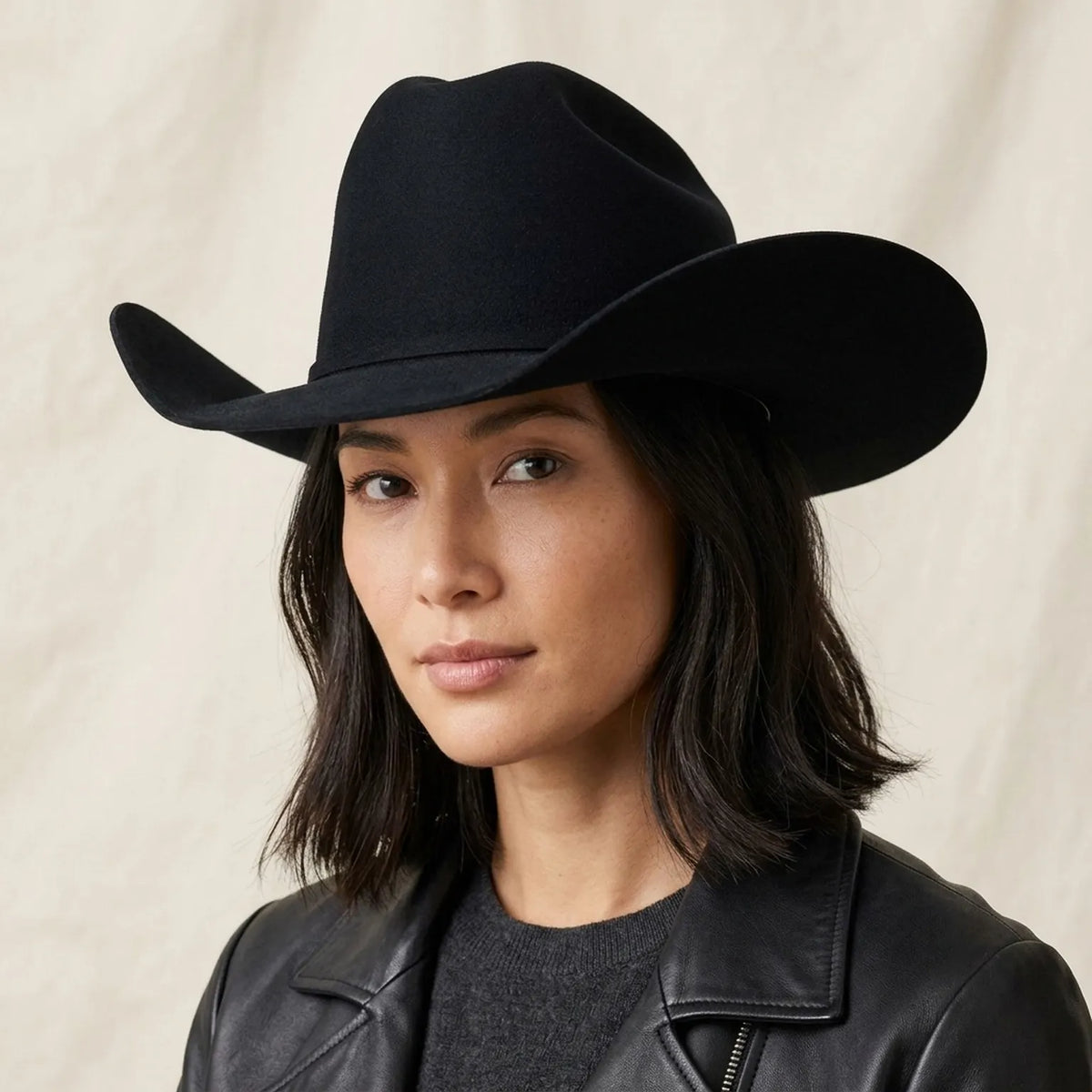 Black Felt Cowboy Hat with Cattleman Crease and Upturned Brim