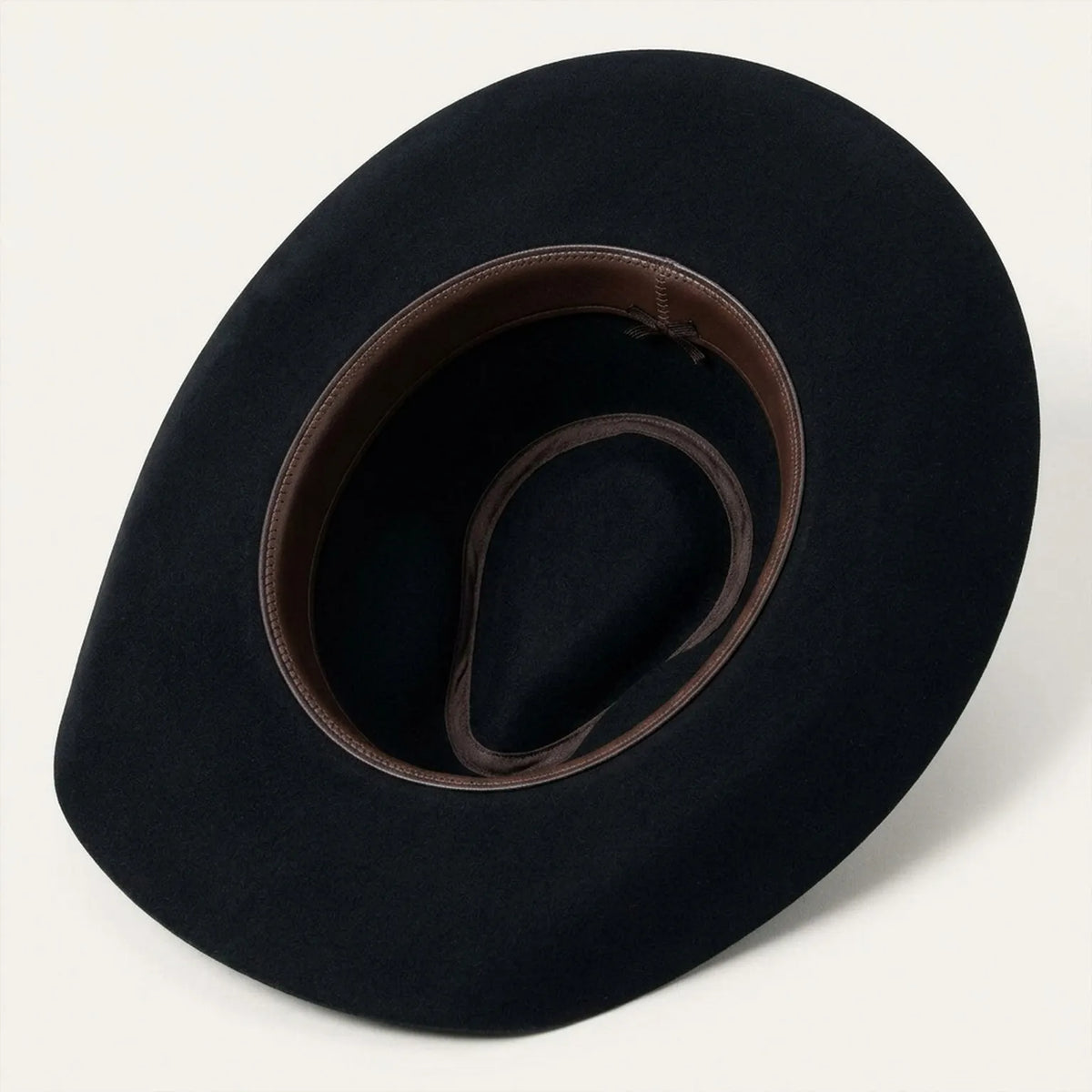 Black Felt Cowboy Hat with Deep Pinched Crease and Upturned Brim