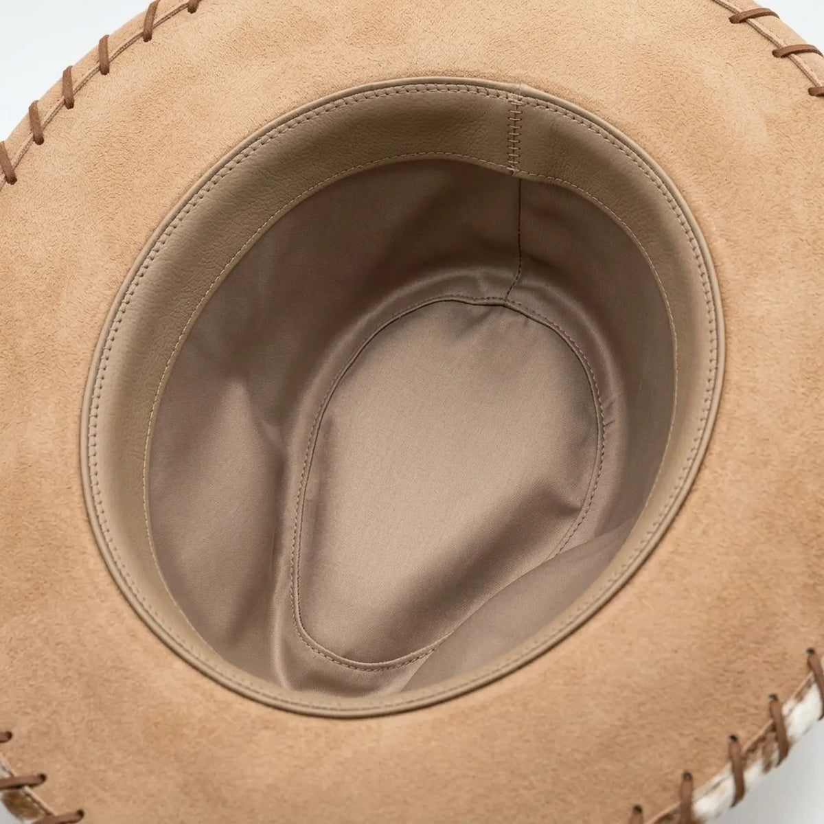 Tan Faux Suede Cowboy Hat with Cow Print Brim and Feather Trim