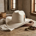 Cream Wool Felt Cowboy Hat with Feather Accent and Upturned Brim